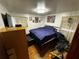 Bedroom featuring hardwood floors, a bed, and natural light from the window at 2933 Arlington Rd, East Point, GA 30344