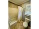 Cozy bathroom featuring a tiled shower-tub combo, complemented by neutral wall colors at 3201 Palisades Se Ct, Marietta, GA 30067