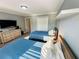 Charming bedroom featuring two twin beds, modern decor, and a spacious closet at 3201 Palisades Se Ct, Marietta, GA 30067