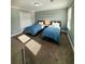 Cozy bedroom featuring two twin beds, natural light, and a spacious closet at 3201 Palisades Se Ct, Marietta, GA 30067