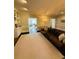 Spacious living room featuring built-in cabinets, dark wood floors, and plush leather sofa at 3201 Palisades Se Ct, Marietta, GA 30067