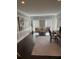 Well-lit home office with neutral wainscoting, modern lighting, and stylish furniture at 3201 Palisades Se Ct, Marietta, GA 30067