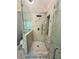 Beautiful glass enclosed shower with white marble-look tile and dual shower heads at 3201 Palisades Se Ct, Marietta, GA 30067
