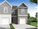 Beautiful two-story townhome with gray siding, white brick, and an attached one-car garage at 508 Crown Dr, Emerson, GA 30137