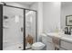 Bathroom with a glass-enclosed shower, a vanity, and modern black fixtures at 512 Crown Dr, Emerson, GA 30137