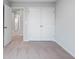 Bedroom featuring neutral walls, carpet floors, and a closet with double doors at 512 Crown Dr, Emerson, GA 30137