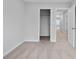 Bedroom featuring neutral walls, carpet floors, closet with wire rack and a doorway to the hallway at 512 Crown Dr, Emerson, GA 30137