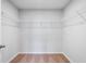 Walk in closet with carpet floors, wire shelving, neutral walls and an interior door at 512 Crown Dr, Emerson, GA 30137