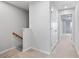 Hallway with neutral carpet and white trim at 512 Crown Dr, Emerson, GA 30137