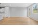 Open concept living room with light wood floors and natural light at 512 Crown Dr, Emerson, GA 30137