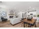 Bright open-concept living space with fireplace and modern kitchen, perfect for entertaining at 512 Crown Dr, Emerson, GA 30137