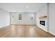 Spacious living room featuring an electric fireplace and ample natural light at 512 Crown Dr, Emerson, GA 30137
