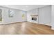 Bright and airy living room with an electric fireplace and access to the outdoors at 512 Crown Dr, Emerson, GA 30137