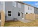 Back of townhome featuring a patio, wooden fence, and AC unit at 512 Crown Dr, Emerson, GA 30137