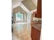 Bright open kitchen and dining area with large windows providing natural light and a view of the backyard at 8130 Estee Dr, Cumming, GA 30028