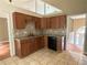 Well-equipped kitchen with wood cabinets and modern appliances at 8130 Estee Dr, Cumming, GA 30028