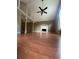Spacious living room with hardwood floors, fireplace, and vaulted ceilings at 8130 Estee Dr, Cumming, GA 30028