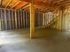 Basement featuring exposed framing, and unfinished concrete floors awaiting customization and personalization at 1163 Park Center Cir, Austell, GA 30168
