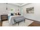 Bright bedroom featuring tray ceiling, neutral tones, and elegant decor, creating a serene and inviting atmosphere at 1272 Hardee Ne St, Atlanta, GA 30307