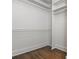 Spacious closet with ample shelving and rods, providing storage and organization at 1272 Hardee Ne St, Atlanta, GA 30307