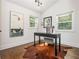 Well-lit home office with hardwood floors, a comfortable desk, and modern decor at 1272 Hardee Ne St, Atlanta, GA 30307