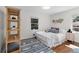 Cozy bedroom features a comfortable bed, decor, and warm natural light at 3205 Mcafee Rd, Decatur, GA 30032
