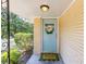 Inviting front entrance featuring a charming door with a wreath and a decorative 'Hello' welcome mat at 3205 Mcafee Rd, Decatur, GA 30032