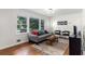 Bright living room features ample natural light, neutral color palette, and comfortable furnishings at 3205 Mcafee Rd, Decatur, GA 30032