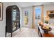 Bright living room with stylish cabinet, natural light, and view to the outdoors at 510 Crown Dr, Emerson, GA 30137