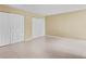 Bedroom with tile floors and double door closet provides ample storage space at 115 Camelot Dr, Atlanta, GA 30349