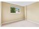 Cozy bedroom with a window allowing natural light and ventilation at 115 Camelot Dr, Atlanta, GA 30349