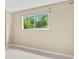 Bedroom view featuring a window with natural light and beautiful outside views at 115 Camelot Dr, Atlanta, GA 30349