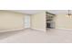Neutral living space featuring a doorway and view into kitchen area at 115 Camelot Dr, Atlanta, GA 30349