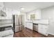 Modern kitchen featuring stainless steel appliances and beautiful granite countertops at 1894 Twin Falls Rd, Decatur, GA 30032