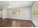 Spacious living room features hardwood floors and natural light from large windows at 1894 Twin Falls Rd, Decatur, GA 30032