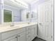 This bathroom features double sinks, ample storage, and a well-lit mirror, great for daily routines at 4856 Habersham Sw Rdg, Lilburn, GA 30047