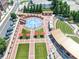 Overhead shot of vibrant public space featuring a splash pad, lawn, and amphitheater at 5195 Oaks Landing Ct, Sugar Hill, GA 30518