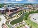 Community with large shopping center, green spaces and pedestrian walkways at 5195 Oaks Landing Ct, Sugar Hill, GA 30518