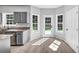 Bright eat-in kitchen with stainless appliances and lots of natural light at 5195 Oaks Landing Ct, Sugar Hill, GA 30518