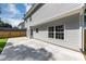 A backyard patio with a gray epoxy surface at 5195 Oaks Landing Ct, Sugar Hill, GA 30518