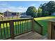 Inviting backyard deck offering scenic views of the expansive lawn and lush greenery, perfect for relaxation and outdoor enjoyment at 842 Shoals Ct, Atlanta, GA 30349