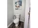 Half bathroom with decorative bowl sink and painted grey walls at 842 Shoals Ct, Atlanta, GA 30349