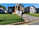 Charming two-story home featuring a manicured lawn and two-car garage at 842 Shoals Ct, Atlanta, GA 30349