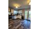 Updated kitchen with stainless steel appliances and white cabinetry at 842 Shoals Ct, Atlanta, GA 30349