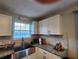 Kitchen with stainless steel appliances and granite counters at 842 Shoals Ct, Atlanta, GA 30349