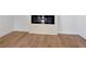 A modern fireplace features clean lines, shiplap detail, and an electric insert at 1337 Fairfield Dr, Lilburn, GA 30047
