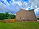 Side view of the home's siding and fenced yard at 171 Shaker Hollow Drive Dr, Mcdonough, GA 30253