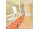 Well-lit bathroom featuring a double sink vanity with lots of counter space at 171 Shaker Hollow Drive Dr, Mcdonough, GA 30253