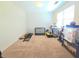A bedroom with neutral carpeting and natural light, ready for personalization and furnishing at 171 Shaker Hollow Drive Dr, Mcdonough, GA 30253