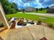 Landscaped front yard with manicured flowerbeds, decorative stones, and healthy green grass at 171 Shaker Hollow Drive Dr, Mcdonough, GA 30253